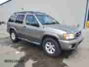 2004 Nissan Pathfinder SE z VIN JN8DR09YX4W918670, wystawiony jako Copart lot #69423415 z przebiegiem 173 678 mil mil oraz Szkoda całkowita • Salvage title. Historia ofert i sprzedaży dostępna na DreamBid. Obrazek 4.