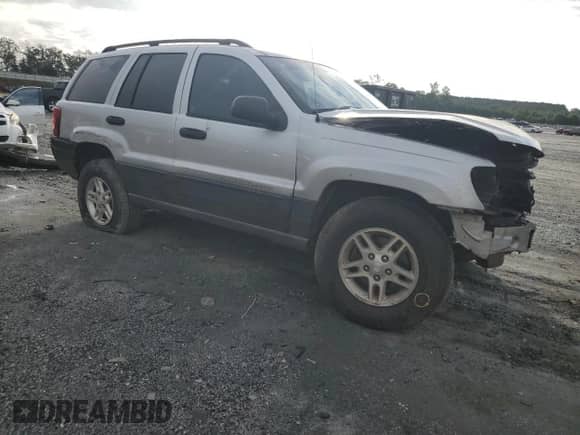 2004 Jeep Grand Cherokee Laredo with VIN 1J4GX48S04C313409, listed as a Copart auction lot 68535425 with Not provided miles and Salvage title. Bid and sale history available at DreamBid. Image 4.