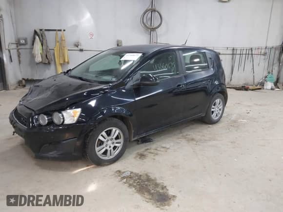 2012 Chevrolet Sonic LS with VIN 1G1JB6SH2C4217205, listed as a IAAI auction lot 43360675 with 101,863 mi miles and . Bid and sale history available at DreamBid. Image 17.