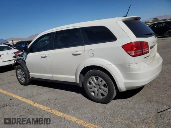 2015 Dodge Journey SE with VIN 3C4PDCAB2FT516876, listed as a Copart auction lot 84073205 with 154,462 mi miles and Salvage title. Bid and sale history available at DreamBid. Image 2.