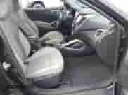 2013 Hyundai Veloster w/Black Int with VIN KMHTC6AD0DU106306, listed as a IAAI auction lot 43409235 with 82,350 mi miles and . Bid and sale history available at DreamBid. Image 5.