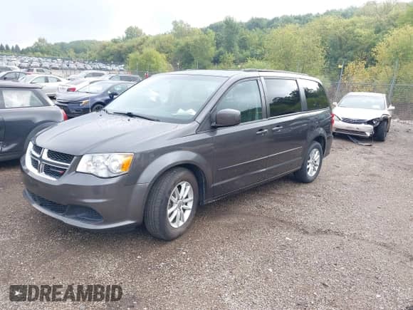 2015 Dodge Grand Caravan SXT with VIN 2C4RDGCG5FR541105, listed as a IAAI auction lot 43282570 with 176,921 mi miles and . Bid and sale history available at DreamBid. Image 2.