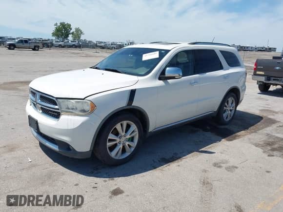 2011 Dodge Durango Crew with VIN 1D4SD4GT2BC638064, listed as a IAAI auction lot 42718445 with 167,602 mi miles and . Bid and sale history available at DreamBid. Image 2.