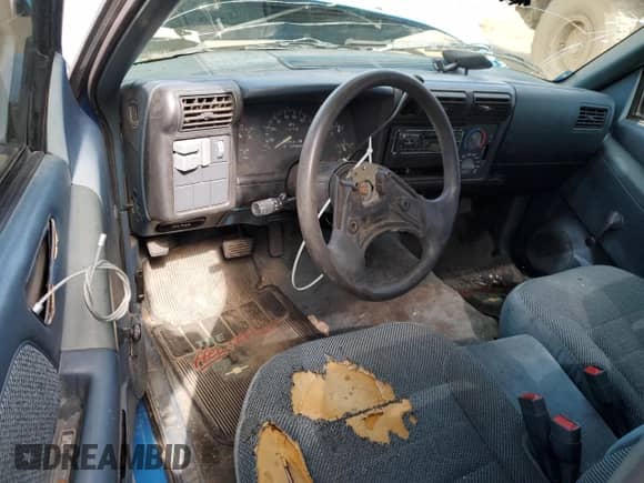1994 Chevrolet S-10 с VIN 1GCCS14Z8R8220670, выставлен на аукционе Copart как лот 54712404 с пробегом 98 814 миль миль и Списание • Salvage title. История ставок и продаж доступна на DreamBid. Изображение 8.