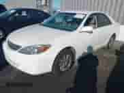 2003 Toyota Camry LE with VIN JTDBE32K730188966, listed as a IAAI auction lot 43482477 with 205,481 mi miles and . Bid and sale history available at DreamBid. Image 6.