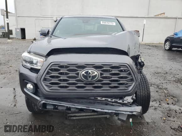 2022 Toyota Tacoma SR с VIN 3TMCZ5AN8NM503984, выставлен на аукционе Copart как лот 89870775 с пробегом 6 091 миль миль и Чистый • Clean title. История ставок и продаж доступна на DreamBid. Изображение 5.