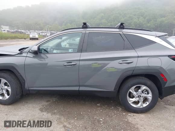 2024 Hyundai Tucson SEL z VIN 5NMJBCDE2RH405098, wystawiony jako IAAI lot #42766392 z przebiegiem 3 902 mil mil oraz . Historia ofert i sprzedaży dostępna na DreamBid. Obrazek 14.