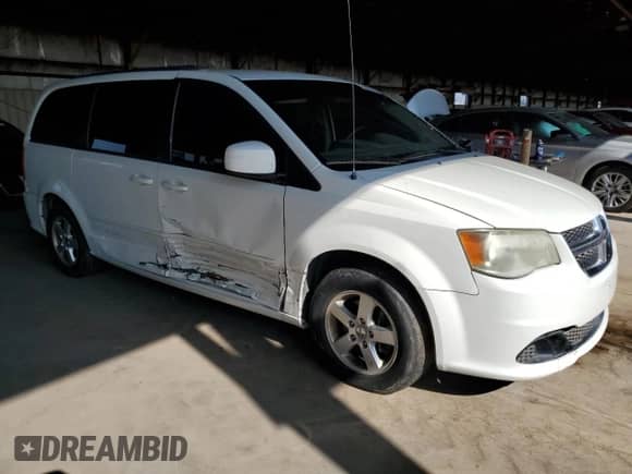 2011 Dodge Grand Caravan Mainstreet with VIN 2D4RN3DG6BR742139, listed as a Copart auction lot 71022515 with 126,565 mi miles and Salvage title. Bid and sale history available at DreamBid. Image 4.