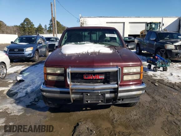 1997 GMC Sierra 1500 z VIN 1GTEK14R3VZ506326, wystawiony jako Copart lot #87036644 z przebiegiem 212 945 mil mil oraz Czysty tytuł • Clean title. Historia ofert i sprzedaży dostępna na DreamBid. Obrazek 5.