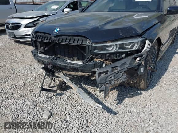 2020 BMW 7 Series 740i z VIN WBA7T2C09LCD15654, wystawiony jako IAAI lot #43329608 z przebiegiem 66 514 mil mil oraz . Historia ofert i sprzedaży dostępna na DreamBid. Obrazek 6.