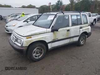 1998 Chevrolet Tracker with VIN 2CNBJ1366W6916401, listed as a IAAI auction lot 43426649 with 98,477 mi miles and . Bid and sale history available at DreamBid. Image 2.