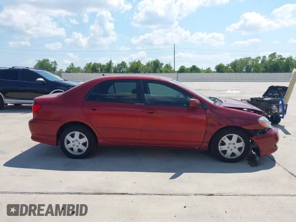 2003 Toyota Corolla LE z VIN 1NXBR32E63Z148736, wystawiony jako IAAI lot #43176096 z przebiegiem 186 129 mil mil oraz . Historia ofert i sprzedaży dostępna na DreamBid. Obrazek 13.