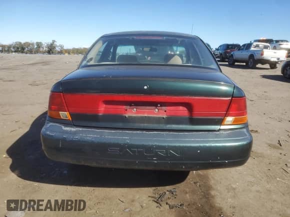 1998 Saturn SL с VIN 1G8ZJ5272WZ182438, выставлен на аукционе Copart как лот 89561645 с пробегом 267 723 миль миль и Чистый • Clean title. История ставок и продаж доступна на DreamBid. Изображение 6.