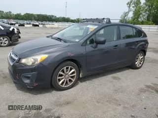 2012 Subaru Impreza Premium with VIN JF1GPAC66CG219434, listed as a Copart auction lot 54122935 with 144,060 mi miles and Salvage title. Bid and sale history available at DreamBid. Image 1.