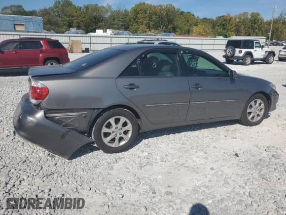 2006 Toyota Camry LE с VIN 4T1BF30K76U624773, выставлен на аукционе Copart как лот 80756905 с пробегом 60 272 миль миль и Списание • Salvage title. История ставок и продаж доступна на DreamBid. Изображение 3.