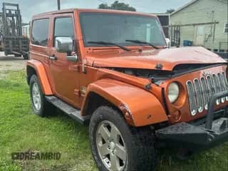 2011 Jeep Wrangler Sahara z VIN 1J4GA5D18BL576541, wystawiony jako IAAI lot #42798149 z przebiegiem 142 246 mil mil oraz . Historia ofert i sprzedaży dostępna na DreamBid. Obrazek 1.