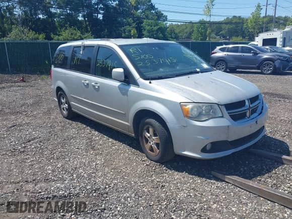 2011 Dodge Grand Caravan Crew with VIN 2D4RN5DGXBR657364, listed as a IAAI auction lot 42952703 with Not provided miles and . Bid and sale history available at DreamBid. Image 1.