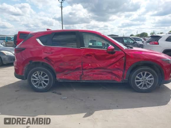 2023 Mazda CX-5 S Preferred z VIN JM3KFBCM8P0256180, wystawiony jako IAAI lot #42356779 z przebiegiem 50 994 mil mil oraz . Historia ofert i sprzedaży dostępna na DreamBid. Obrazek 13.