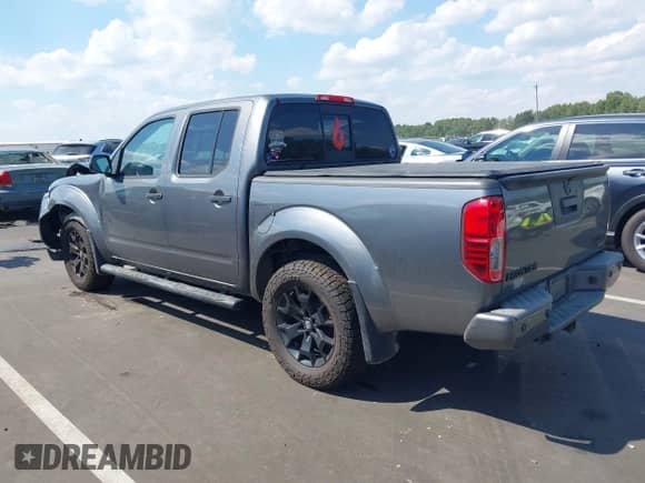 2021 Nissan Frontier Pro-4X with VIN 1N6ED0EB2MN713637, listed as a IAAI auction lot 43128392 with 90,237 mi miles and . Bid and sale history available at DreamBid. Image 3.