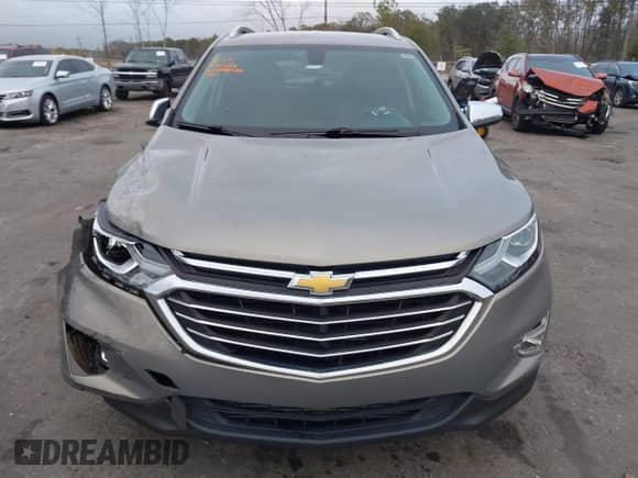 2018 Chevrolet Equinox Premier with VIN 3GNAXMEV7JS547991, listed as a IAAI auction lot 41208640 with 98,879 mi miles and . Bid and sale history available at DreamBid. Image 12.