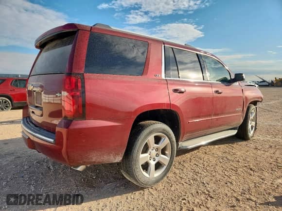 2016 Chevrolet Tahoe LTZ с VIN 1GNSKCKC0GR477553, выставлен на аукционе Copart как лот 81628955 с пробегом 200 483 миль миль и Списание • Salvage title. История ставок и продаж доступна на DreamBid. Изображение 3.
