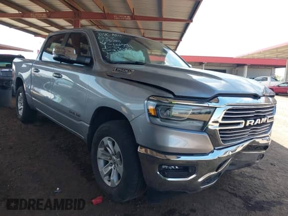 2023 Ram 1500 Laramie z VIN 1C6SRFJT8PN668241, wystawiony jako IAAI lot #42919042 z przebiegiem 27 016 mil mil oraz . Historia ofert i sprzedaży dostępna na DreamBid. Obrazek 1.