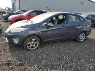 2012 Ford Fiesta SEL with VIN 3FADP4CJ0CM186574, listed as a Copart auction lot 67540365 with 63,252 mi miles and Clean title. Bid and sale history available at DreamBid. Image 1.