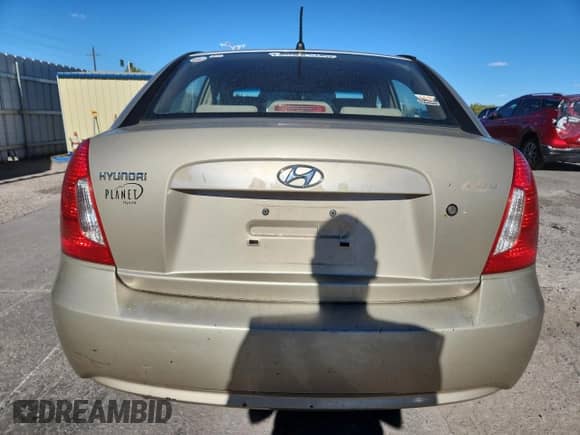 2006 Hyundai Accent GLS z VIN KMHCN46C36U040755, wystawiony jako Copart lot #86664095 z przebiegiem 226 111 mil mil oraz Szkoda całkowita • Salvage title. Historia ofert i sprzedaży dostępna na DreamBid. Obrazek 6.
