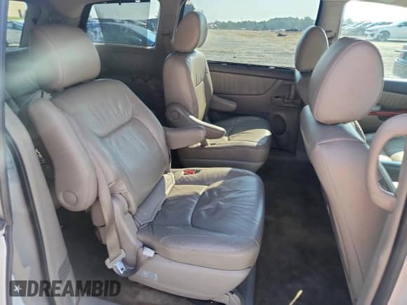 2010 Toyota Sienna XLE Limited с VIN 5TDYK4CC5AS300190, выставлен на аукционе Copart как лот 81425525 с пробегом 184 712 миль миль и Списание • Salvage title. История ставок и продаж доступна на DreamBid. Изображение 10.
