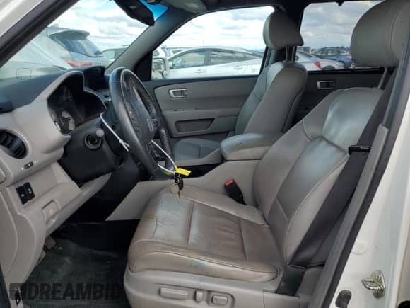 2014 Honda Pilot Touring with VIN 5FNYF4H94EB046869, listed as a Copart auction lot 71682085 with 78,755 mi miles and Salvage title. Bid and sale history available at DreamBid. Image 7.