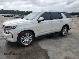 2023 Chevrolet Tahoe High Country с VIN 1GNSKTKL6PR290527, выставлен на аукционе Copart как лот 69781355 с пробегом 21 557 миль миль и Списание • Salvage title. История ставок и продаж доступна на DreamBid. Изображение 1.