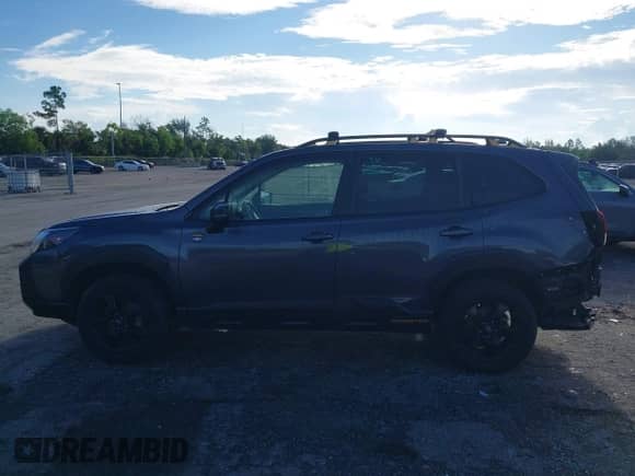 2022 Subaru Forester Wilderness with VIN JF2SKAMC4NH423882, listed as a IAAI auction lot 43272111 with 77,225 mi miles and . Bid and sale history available at DreamBid. Image 15.