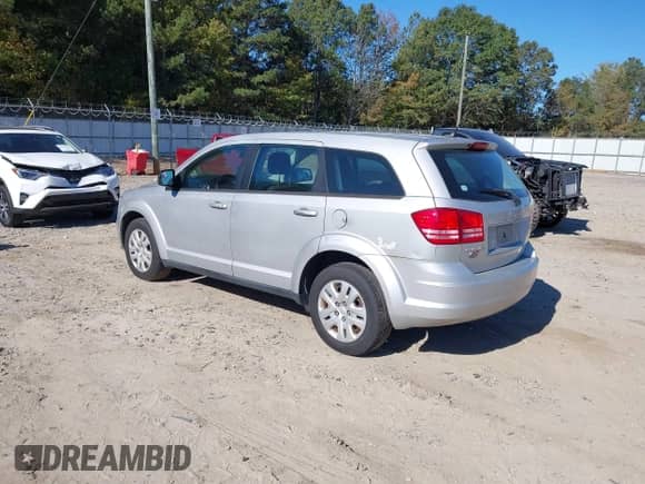 2014 Dodge Journey American Value with VIN 3C4PDCAB1ET280784, listed as a IAAI auction lot 43444352 with 151,715 mi miles and . Bid and sale history available at DreamBid. Image 3.