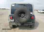 2003 Jeep Wrangler Rubicon с VIN 1J4FA69S43P327618, выставлен на аукционе Copart как лот 70574135 с пробегом 111 917 миль миль и Списание • Salvage title. История ставок и продаж доступна на DreamBid. Изображение 6.