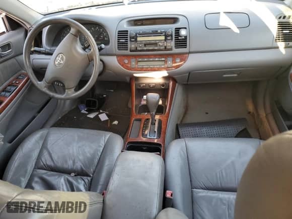 2003 Toyota Camry LE с VIN 4T1BF30K33U563742, выставлен на аукционе Copart как лот 85726885 с пробегом Не указан миль и На запчасти • Non repairable. История ставок и продаж доступна на DreamBid. Изображение 8.