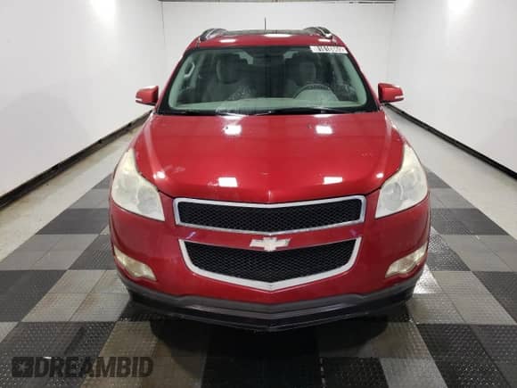 2012 Chevrolet Traverse 1LT with VIN 1GNKRGED1CJ283548, listed as a Copart auction lot 81618865 with 143,541 mi miles and Clean title. Bid and sale history available at DreamBid. Image 5.