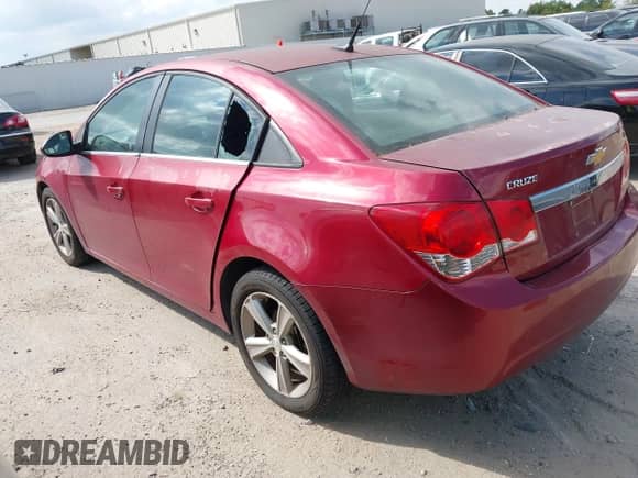 2013 Chevrolet Cruze 2LT z VIN 1G1PE5SB0D7134668, wystawiony jako IAAI lot #43476399 z przebiegiem 159 045 mil mil oraz . Historia ofert i sprzedaży dostępna na DreamBid. Obrazek 3.