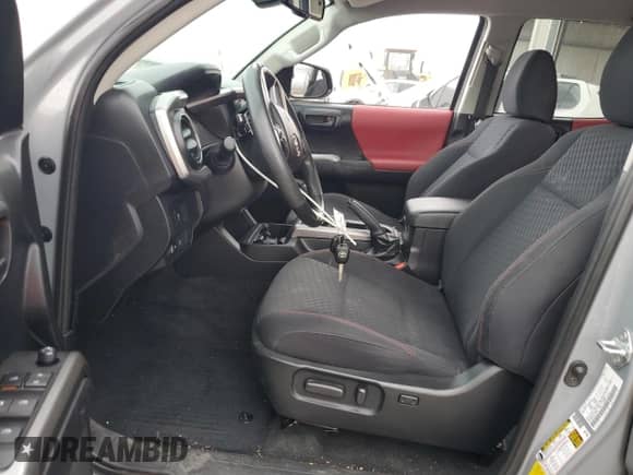 2021 Toyota Tacoma TRD Off Road with VIN 3TMCZ5AN5MM429356, listed as a Copart auction lot 71444135 with 68,728 mi miles and Salvage title. Bid and sale history available at DreamBid. Image 7.