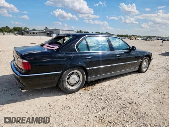1998 BMW 7 Series с VIN WBAGK2327WDH68707, выставлен на аукционе Copart как лот 71478595 с пробегом 176 232 миль миль и Списание • Salvage title. История ставок и продаж доступна на DreamBid. Изображение 3.