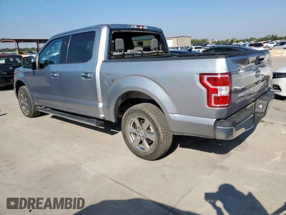 2020 Ford F-150 XL with VIN 1FTEW1C56LFA21955, listed as a Copart auction lot 81960245 with 92,002 mi miles and Salvage title. Bid and sale history available at DreamBid. Image 2.