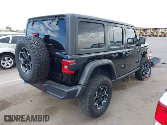 2022 Jeep Wrangler Unlimited Rubicon with VIN 1C4JJXR64NW256714, listed as a IAAI auction lot 42769010 with 35,291 mi miles and . Bid and sale history available at DreamBid. Image 4.