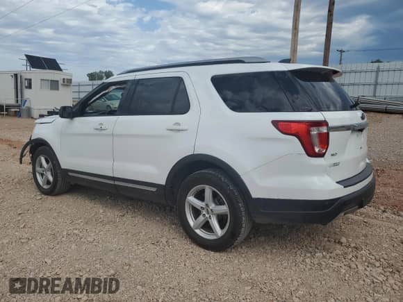 2018 Ford Explorer XLT with VIN 1FM5K7D8XJGB64627, listed as a Copart auction lot 83804395 with 141,653 mi miles and Salvage title. Bid and sale history available at DreamBid. Image 2.