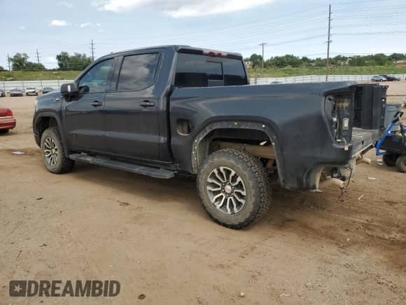 2020 GMC Sierra 1500 AT4 with VIN 1GTU9EET5LZ312628, listed as a Copart auction lot 71525935 with 98,536 mi miles and Salvage title. Bid and sale history available at DreamBid. Image 2.