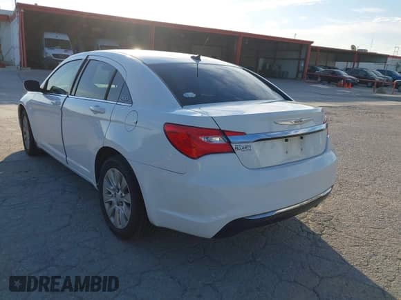 2014 Chrysler 200 LX with VIN 1C3CCBAB0EN140841, listed as a IAAI auction lot 43394740 with 160,614 mi miles and . Bid and sale history available at DreamBid. Image 3.