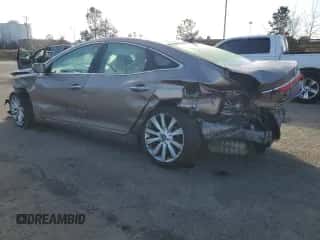 2013 Hyundai Azera с VIN KMHFH4JG6DA312812, выставлен на аукционе Copart как лот 86901174 с пробегом 256 370 миль миль и Списание • Salvage title. История ставок и продаж доступна на DreamBid. Изображение 2.