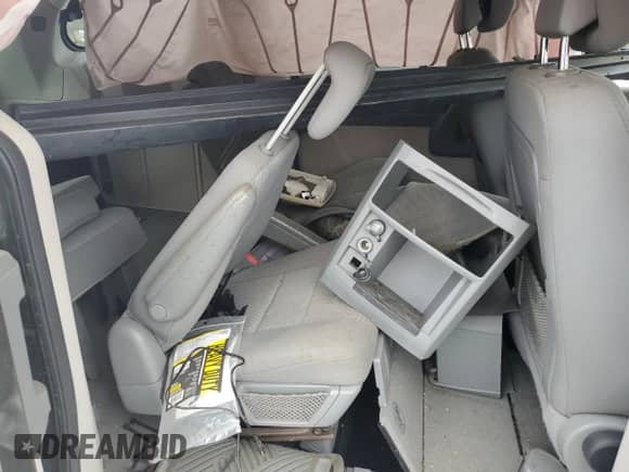 2010 Dodge Grand Caravan Hero z VIN 2D4RN3D15AR453151, wystawiony jako Copart lot #69928325 z przebiegiem Nie podano mil oraz Nie do naprawy • Non repairable. Historia ofert i sprzedaży dostępna na DreamBid. Obrazek 11.