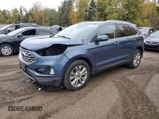 2019 Ford Edge Titanium with VIN 2FMPK4K90KBC64988, listed as a Copart auction lot 87203955 with 168,382 mi miles and Salvage title. Bid and sale history available at DreamBid. Image 1.