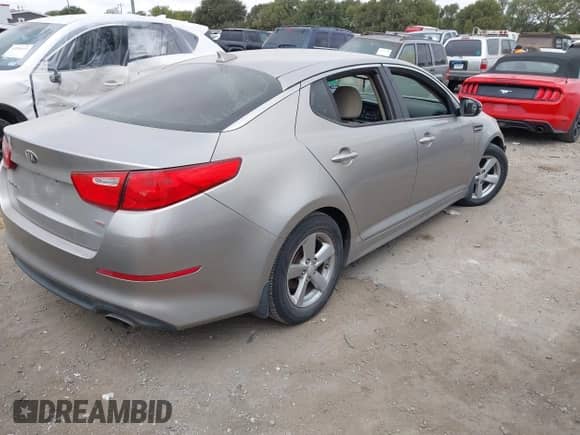 2014 Kia Optima LX with VIN 5XXGM4A73EG351335, listed as a IAAI auction lot 43287799 with 176,349 mi miles and . Bid and sale history available at DreamBid. Image 4.