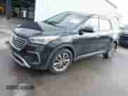 2017 Hyundai Santa Fe SE with VIN KM8SMDHF8HU175884, listed as a IAAI auction lot 42701609 with 154,605 mi miles and . Bid and sale history available at DreamBid. Image 2.