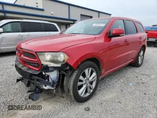2012 Dodge Durango R/T with VIN 1C4SDJCT3CC116577, listed as a Copart auction lot 65397015 with 157,732 mi miles and Salvage title. Bid and sale history available at DreamBid. Image 1.